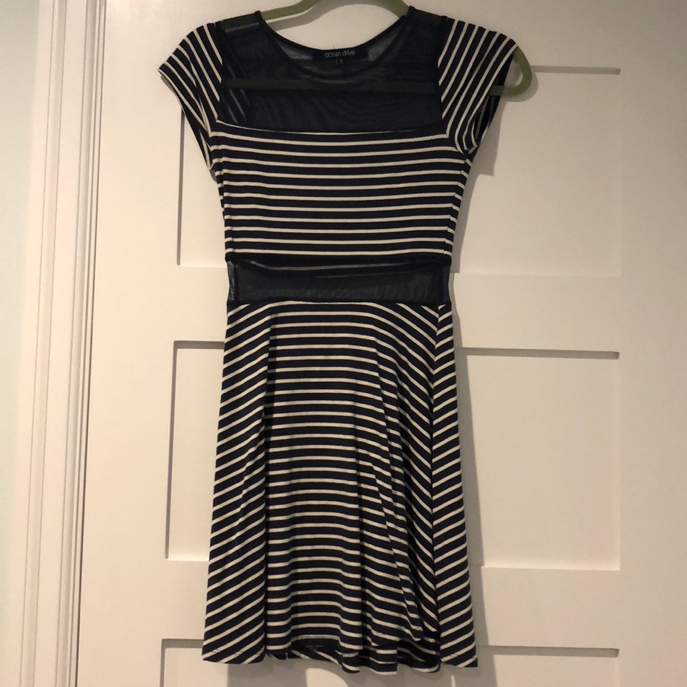 Dress with mesh waist and neckline